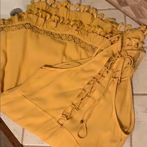 Lace- up dress with ruffle/fringe bottom